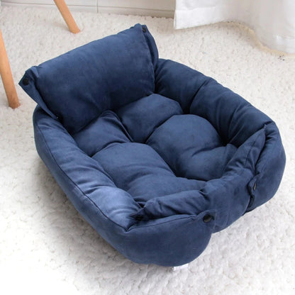 Coussin pour chien bleu à mémoire de forme avec rebords rembourrés, utilisé en intérieur