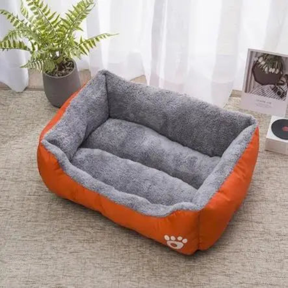 Coussin pour chien gris et orange moelleux avec côtés rembourrés